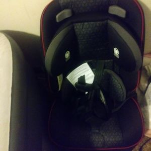 It's a toddler carseat three in one and it's black